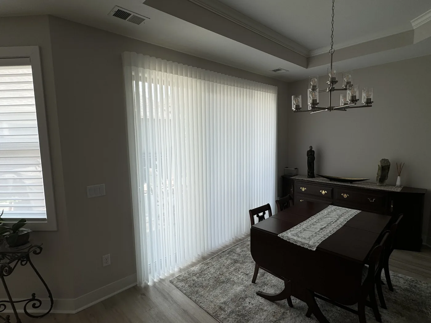 Custom window treatment installation in a Boulder bedroom, Howard's Draperies